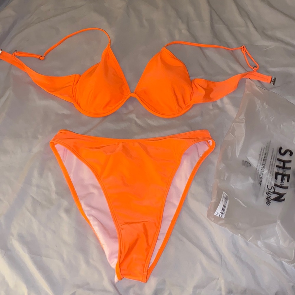 Brand new, never worn shein swimsuit. Color: orange